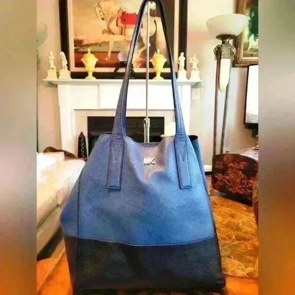 Michael Kors Handbags - Michael Kors 2tone Blue leather bag